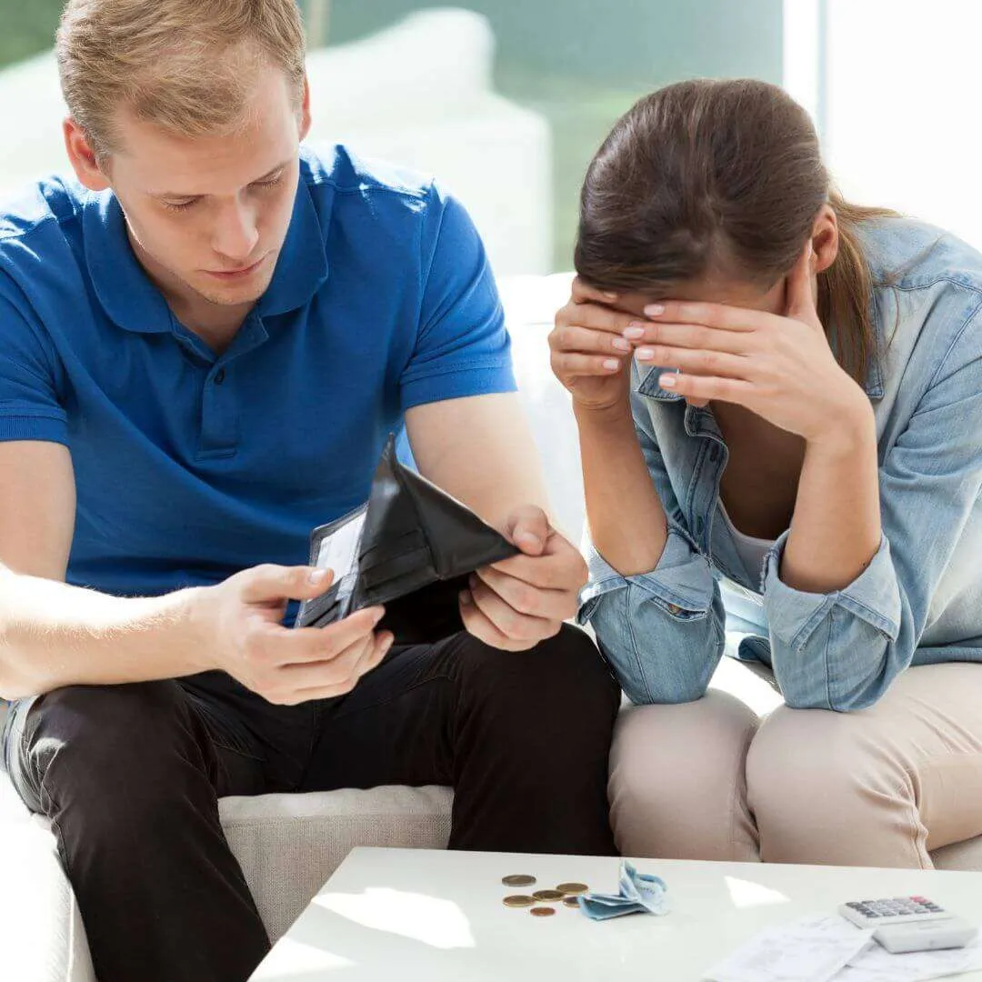 husband and wife trying to make tough decision with little money