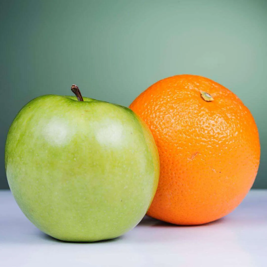 apple and orange compared representing high ticket sales trainings compared