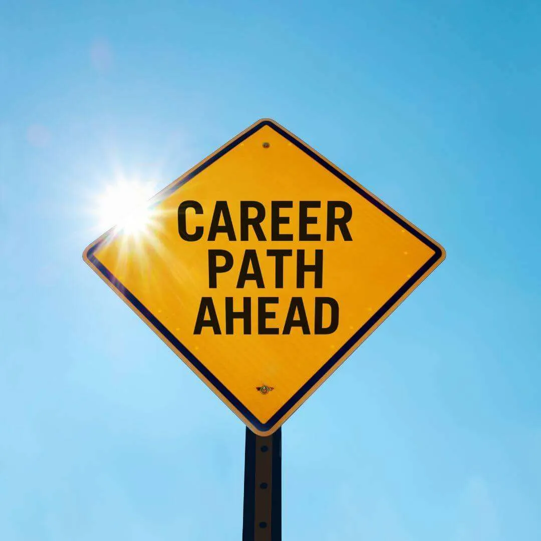 yellow road sign about career path career change ahead